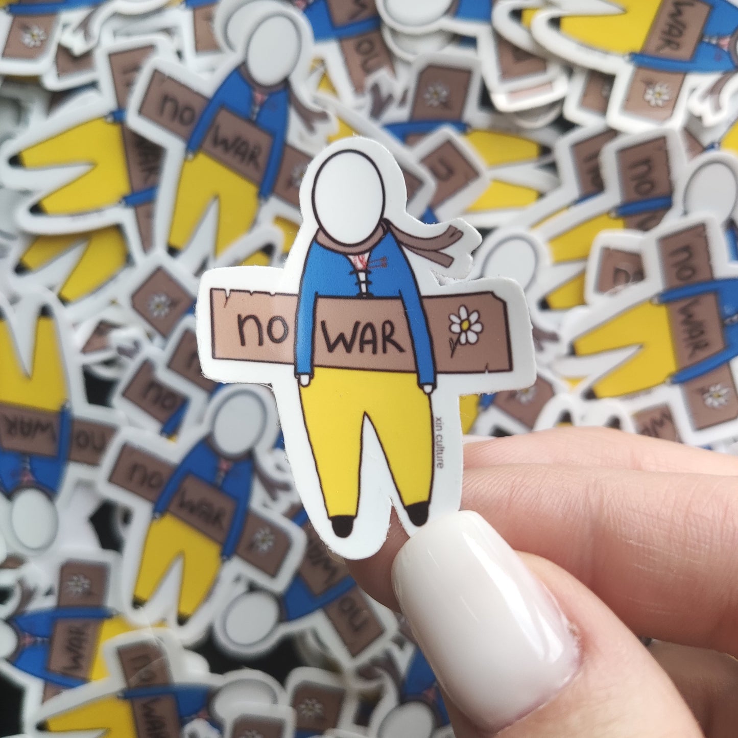 "NO WAR" sticker